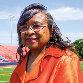 Jacquelyn Stephens standing in front of the SSU football field